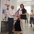 A student receiving an award