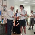 A student receiving an award