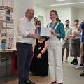 A student receiving an award