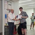 A student receiving an award
