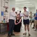 A student receiving an award