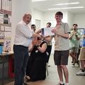 A student receiving an award