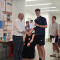 A student receiving an award