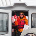 Bob Hilton holding some tubing and looking happy, sampling on the Mackenzie Delta, June 2024   