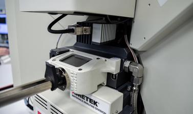 The door to the CAMECA SX-5 FE in the E-Beam Suite in the Earth Sciences Department. The door is shut. 