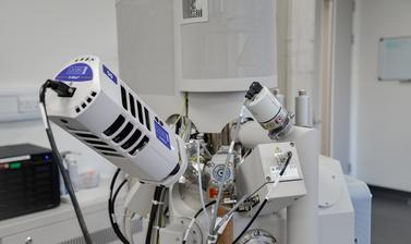 The images focuses on the energy-dispersive x-ray spectroscopy detector system. The background includes the rest of the FEI Quanta 650 in the Earth Sciences Department E-Beam Suite