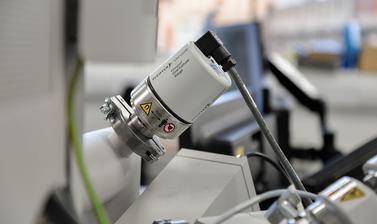 The image is focused on the Compact Cold Cathode Gauge of the FEI Quanta 650 SEM located in the E-Beam Suite of the Earth Sciences Department. 