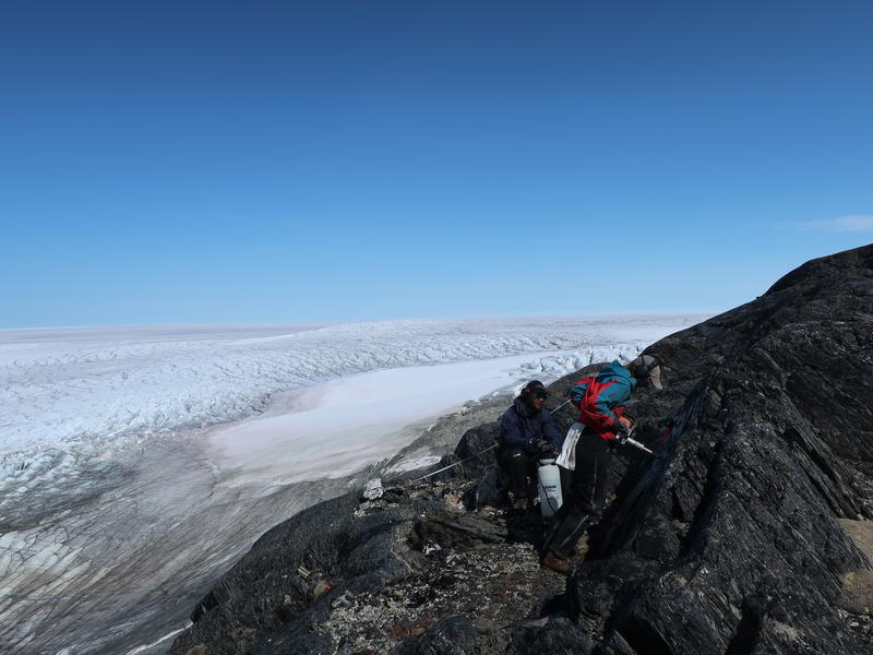 Collecting samples for paleomagnetic analysis Photograph of lead author, Claire Nichols, collecting samples for paleomagnetic analysis above the Greenland Ice Sheet