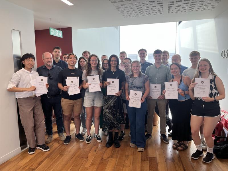 Group photo of award winners at finals party