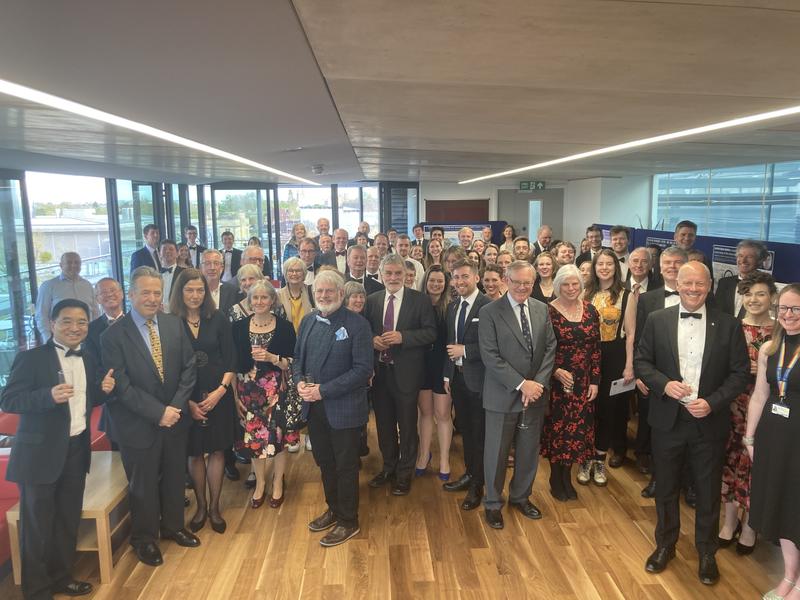 Alumni Dinner Group Photo 2023 Group photo of attendees of the 2023 Earth Sciences Alumni Dinner, taken in the Researcher's Common Room. Guests are wearing smart attire and smiling at the camera.