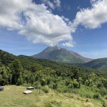 View of the steaming summit of the Soufriere Hills Volcano, Montserrat, in March