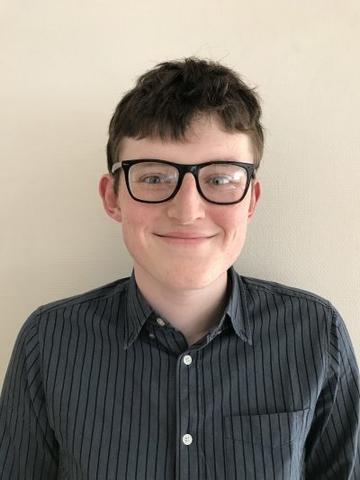 A headshot of Jack