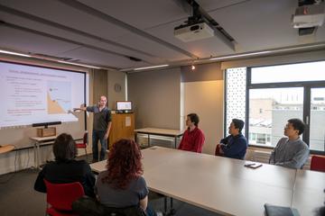 Undergrad teaching Students and teacher in seminar room