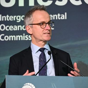 Gideon Henderson giving a speech