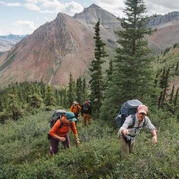Ross Anderson hiking in the mountains with a colleague