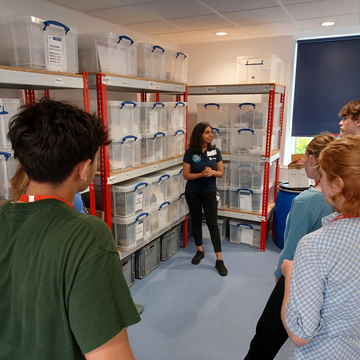 Kamini Manick giving a tour of storage facilities